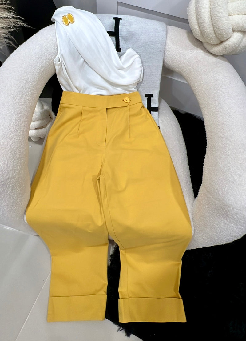 Yellow pant an blouse white ,